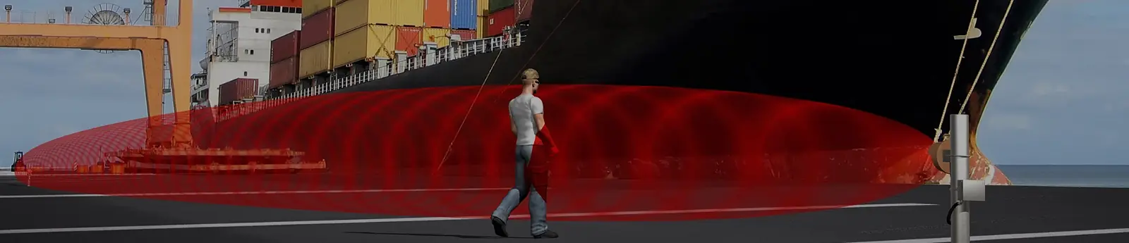 Visualisierung: Person geht an einem Containerschiff im Hafen entlang durch eine rot markierte Mikrowellen-Detektionszone – Visualisierung Southwest Microwave (Symbolbild): Mikrowellendetektion im Hafen.